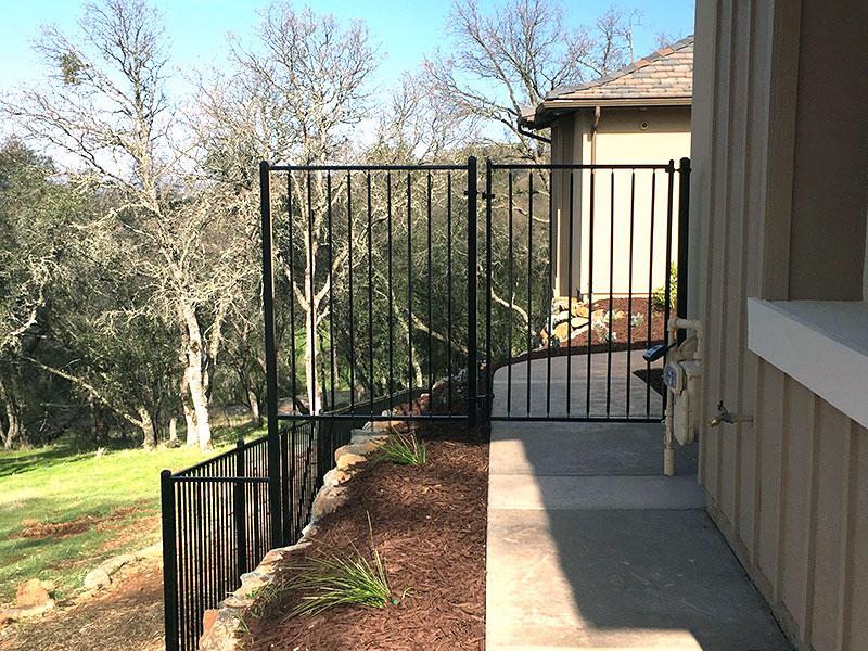Iron Fence Gate Construction Iron gate with fence built for residential property