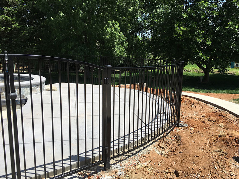 Iron Fence Gate Construction Iron gate with fence built for commercial property