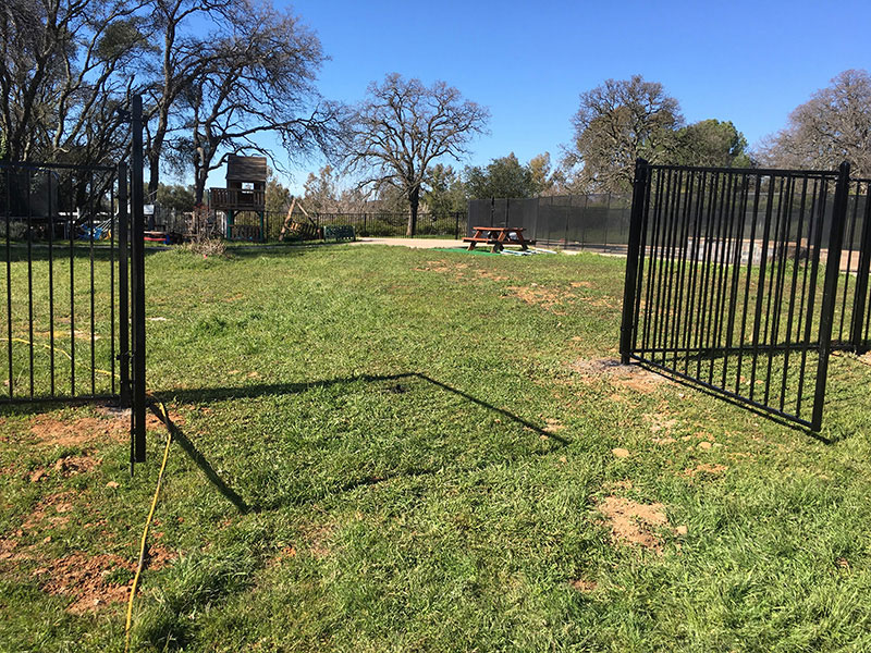 Iron Fence Gate Construction Iron gate with fence built for commercial property