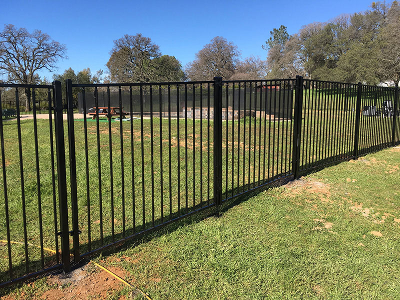 Iron Fence Gate Construction Iron gate with fence built for commercial property
