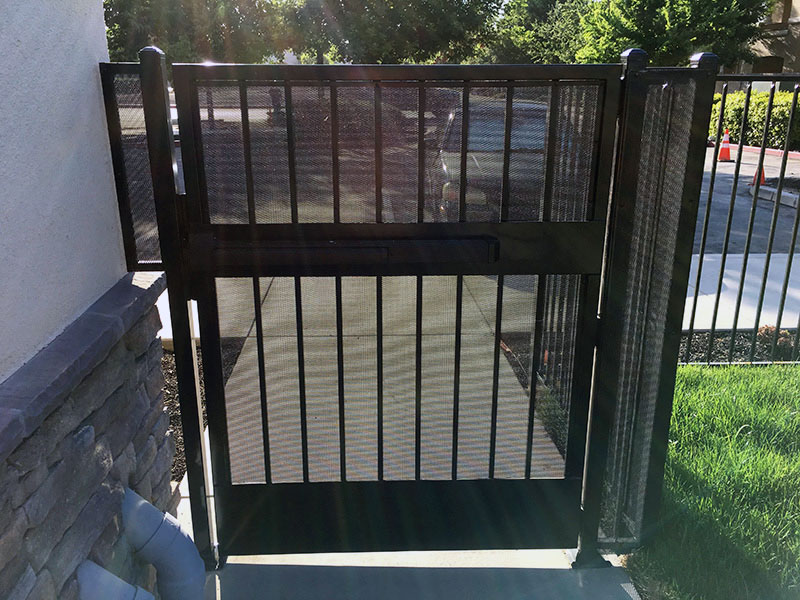Iron Fence Gate Construction Iron gate with fence built for commercial property