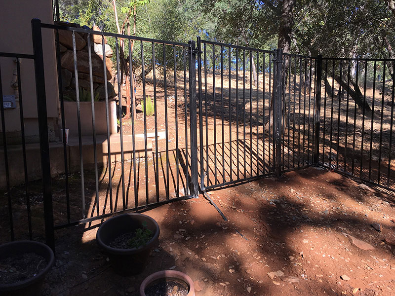 Iron Fence Gate Construction Iron gate with fence built for residential property