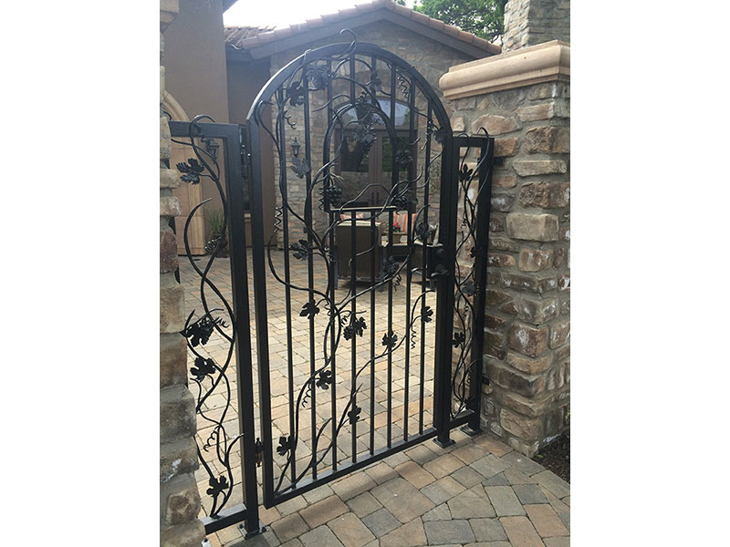 Iron Fence Gate Construction Iron gate with brick/mason fence built for residential property